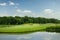 Mirror lake, lawn for golfing on golf course