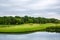 Mirror lake, lawn for golfing on golf course