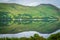 Mirror like reflections over Loch Broom in a cloudy morning.