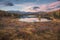 Mirror Surface Lake Early Sunset Wide Angle Autumn Landscape With Mountain Range On Background