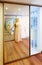 Mirror wardrobe in modern hall interior with infinity reflection
