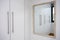 Mirror in white closet room, wardrobe modern design, white and clean