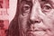 A mirrored image of Franklin`s face on an American 100 USD note. Memorable, conspicuous and tense illustration on the financial