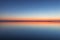 Mirroring sky in the water at twilight. Summer night picture of