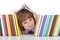 Mischievous kid with freckles and books