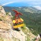 MISHOR, CRIMEA, UKRAINE - MAY 12: People travel by rope way cab on top of Ai-Petri Mountain on May 12, 2013 in Mishor