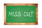 MISS  OUT text written on green school board