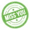 MISS YOU text on green round grungy stamp