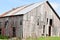 Missing parts on a run down barn in Texas