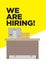 Missing working desk with the copy of We are Hiring! Concept of recruitment or job opportunity
