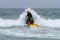 MISSION BAY, CA-USA-11 JULY 2018 - Lifeguard takes wave to the f