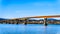 Mission Bridge over the Fraser River on Highway 11 between Abbotsford and Mission with snow covered Mount Robie Reid