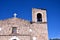 Mission church against blue sky Chihuahua state, Mexico