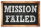 MISSION FAILED words on black wooden frame school blackboard