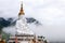 Mist Clound on Pha Hid Kaew Temple Buddha of Buddhism on blue sky and clound backgorund,Khao Kho, Phetchabun Province, Thailand