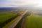 Mist covering local village. Autumn aerial landscape