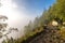 mist rising from valleys in forest in slovakia Tatra mountains