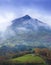 Mists and clouds over the forests with Mount Balerdi in the background in the Araitz Valley, Navarra