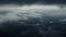 Misty Aerial View Of Dark Skies Over An Ocean
