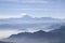 Misty blue Andean mountain landscape background