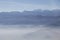 Misty blue Andean mountain landscape background