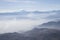 Misty blue Andean mountain landscape background