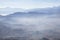 Misty blue Andean mountain landscape background