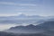 Misty blue Andean mountain landscape background