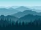 Misty blue mountain silhouettes background