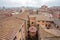 Misty cityscape of Siena, Tuscany town roofs and old houses. Italian city, UNESCO World Heritage Site