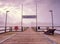 Misty dusk on the landmark fishing pier, pier railings. Wooden mole