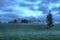 Misty farming landscape at dusk