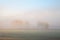Misty farmland background