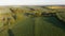 Misty fields in morning birds eye view