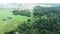 Misty fields in morning birds eye view