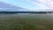 Misty fields in morning birds eye view