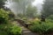 misty garden with bronze figurine and stone bench