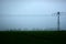 Misty gloomy landscape cloudy sky field