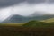 Misty green hills near Stob Dearg and Rannoch Moor in Scotland