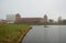 Misty January morning and an old castle