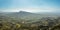 Misty landscape of western Rhodes island in the afternoon. Panorama from Attaviros mountains to coastline of Turkey from atop