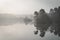 Misty morning fog over lake with trees in reflection. Ochtend mist over ven in de Oisterwijkse bossen en vennen