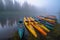 Misty Morning Kayaks by the Lake Shore