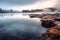 misty morning at a serene geothermal lake