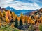 Misty morning view from the top of Giau pass at hte end of October. Impressive autumn scene of Dolomite Alps, Cortina d`Ampezzo l