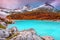 Misty mountains with turquoise alpine glacier lake, Sorapis, Dolomites, Italy