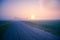 Misty Pathways: Enchanting Gravel Dirt Country Road in a Summer Morning Fog