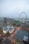 In a misty rain an elevated view of Gateway Arch and the historical Old St. Louis Courthouse. The Courthouse was constructed of b