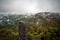 Misty rainy morning landscape with the sand rocky montains in Bohemian Saxon Switzerland in autumn colors