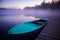 Misty Serenity: Teal Rowing Boat and Wooden Footbridge Embraced by Summer Morning Fog